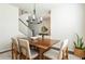 Cozy dining room with a wooden table, seating for six, and stylish decor at 5025 Bryce Ln, Cumming, GA 30040