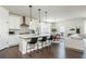 Modern kitchen featuring a kitchen island, stainless steel appliances, and hardwood floors at 5025 Bryce Ln, Cumming, GA 30040
