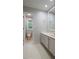 Bathroom with tiled floor, vanity, and commode at 6010 Spalding Dr, Atlanta, GA 30350