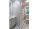 Bathroom featuring tiled floor, vanity, commode and a shower at 6010 Spalding Dr, Atlanta, GA 30350