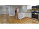 Well-designed kitchen with stainless steel appliances, gas range, and seamless flow into the living spaces at 6010 Spalding Dr, Atlanta, GA 30350