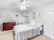 Cozy bedroom featuring neutral paint, a ceiling fan and comfortable furnishings at 710 Freeman Dr, Covington, GA 30016