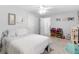 Bright bedroom featuring a ceiling fan, neutral paint, and a colorful ' toy storage unit at 710 Freeman Dr, Covington, GA 30016