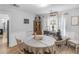 Charming dining room with natural light, stylish decor, and hardwood floors, perfect for Gathering gatherings at 710 Freeman Dr, Covington, GA 30016