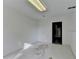 Unfinished basement with a utility door at 1285 Cedar Brook Dr, Lawrenceville, GA 30043