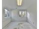 Unfinished basement space with dual windows bringing in natural light at 1285 Cedar Brook Dr, Lawrenceville, GA 30043