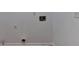 Damaged and exposed electrical outlets and wiring with missing sheetrock and wood floors at 1285 Cedar Brook Dr, Lawrenceville, GA 30043