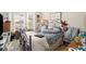 Cozy bedroom with a wrought-iron bed frame, filled with personal touches, and natural light at 1290 Silverstone Trl, Jonesboro, GA 30238