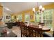 Sunny breakfast area with ample natural light and a view to the outdoor deck at 1290 Silverstone Trl, Jonesboro, GA 30238