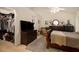 Spacious main bedroom with a walk-in closet and a connected sitting area at 1290 Silverstone Trl, Jonesboro, GA 30238