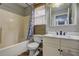 Bathroom featuring a tub and a vanity at 4090 Mark Todd Ct, Hoschton, GA 30548
