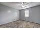 Bedroom with neutral carpet, window, and painted walls at 4090 Mark Todd Ct, Hoschton, GA 30548