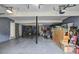 The spacious garage offers ample storage space with overhead lighting at 4090 Mark Todd Ct, Hoschton, GA 30548
