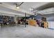 The spacious garage offers ample storage space with overhead garage door at 4090 Mark Todd Ct, Hoschton, GA 30548