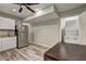 This kitchen features stainless steel appliances, wood look floors, and ample cabinet space at 4090 Mark Todd Ct, Hoschton, GA 30548