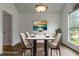Dining area featuring a modern table, chairs, and a decorative view at 7434 Chads Cir, Jonesboro, GA 30236