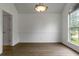 Dining area featuring a light fixture, fresh paint, and neutral colored flooring at 7434 Chads Cir, Jonesboro, GA 30236