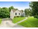 Inviting exterior view of a charming home with a driveway and well-manicured front yard at 7434 Chads Cir, Jonesboro, GA 30236