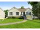 Charming home with well-maintained lawn, inviting front porch, and classic curb appeal at 7434 Chads Cir, Jonesboro, GA 30236