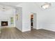 Bright living room with fireplace, new flooring, and neutral paint at 7434 Chads Cir, Jonesboro, GA 30236
