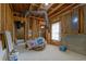 Spacious unfinished basement with exposed wood framing, concrete foundation, and potential for customization at 7434 Chads Cir, Jonesboro, GA 30236