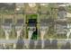 Aerial view of a home with a well-manicured lawn at 9120 Alden Dr, Locust Grove, GA 30248