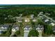 Residential area showcasing homes with mature trees and well-manicured lawns at 9120 Alden Dr, Locust Grove, GA 30248
