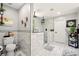 Modern bathroom featuring dual shower heads, stylish marble tiling, and sleek fixtures at 100 Chadwick Pl, Villa Rica, GA 30180