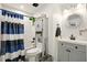 Bathroom with shower-tub combination, updated vanity, and black fixtures at 100 Chadwick Pl, Villa Rica, GA 30180