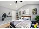 Bedroom featuring vaulted ceilings, grey walls, and plenty of natural light at 100 Chadwick Pl, Villa Rica, GA 30180