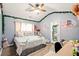 Bedroom featuring charming decor, soft colors, and a cozy, comfortable feel at 100 Chadwick Pl, Villa Rica, GA 30180