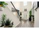 This home foyer has high ceilings, natural lighting, and modern decor at 100 Chadwick Pl, Villa Rica, GA 30180