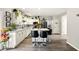 This is a newly remodeled kitchen with an island and seating, stainless steel appliances, and modern finishes at 100 Chadwick Pl, Villa Rica, GA 30180