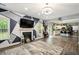 This open living room and kitchen provides an abundance of natural light at 100 Chadwick Pl, Villa Rica, GA 30180