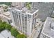 Upscale condo building with multiple balconies and sleek, modern design at 3040 Peachtree Nw Rd # 1803, Atlanta, GA 30305