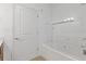 Bathroom with a bathtub and glass shower screen at 3040 Peachtree Nw Rd # 1803, Atlanta, GA 30305