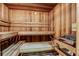 Warm wooden sauna with multi-tiered bench seating at 3040 Peachtree Nw Rd # 1803, Atlanta, GA 30305