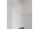 Walk-in closet with wire shelving and tile flooring at 3040 Peachtree Nw Rd # 1803, Atlanta, GA 30305