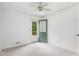 Bedroom has neutral carpet with direct access to a covered patio and backyard at 320 Edna Dr, Stockbridge, GA 30281