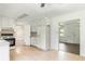 Functional kitchen with white appliances and tile flooring at 320 Edna Dr, Stockbridge, GA 30281