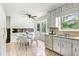 Cozy kitchen with eat-in table, updated appliances, and bright, natural light at 320 Edna Dr, Stockbridge, GA 30281