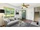 Inviting living room with lots of natural light, neutral furniture, and a cozy ambiance at 320 Edna Dr, Stockbridge, GA 30281