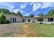 The backyard of this home features a patio and lush lawn at 3467 Clubland Dr, Marietta, GA 30068