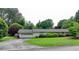 Single-story home with attached garage and manicured lawn at 3467 Clubland Dr, Marietta, GA 30068