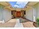 Inviting stone entryway with a beautifully crafted wooden front door and seating at 3467 Clubland Dr, Marietta, GA 30068