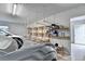 A well-lit garage featuring ample space for parking and storage, with shelving and overhead racks at 3467 Clubland Dr, Marietta, GA 30068