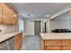 Open kitchen offers light wood cabinets, modern countertops, and an adjacent living area at 3467 Clubland Dr, Marietta, GA 30068
