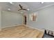 Spacious living room showcasing hardwood floors, recessed lighting, and an open doorway at 3467 Clubland Dr, Marietta, GA 30068