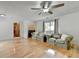 Spacious living room featuring hardwood floors, neutral walls, and a modern ceiling fan at 3467 Clubland Dr, Marietta, GA 30068