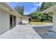 A concrete patio outside the double doors of this home creates a great outdoor living space at 3467 Clubland Dr, Marietta, GA 30068